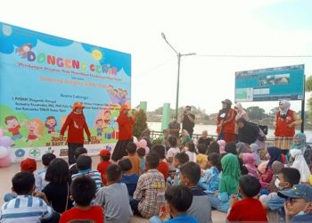 Dinas Arsip dan Perpustakaan Kota Jambi Mendongeng di Hadapan 100 Anak di Danau Sipin
